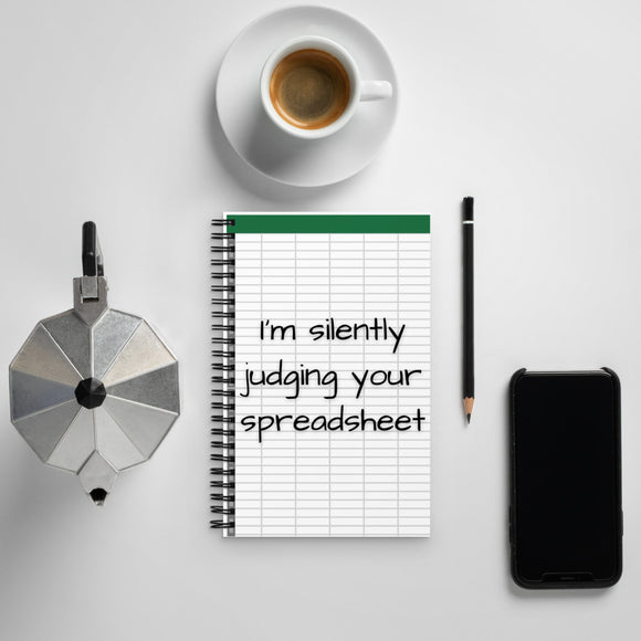 I'm silently judging your spreadsheet Spiral dotted notebook